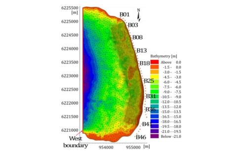 The computational mesh and bathymetry of the study area.